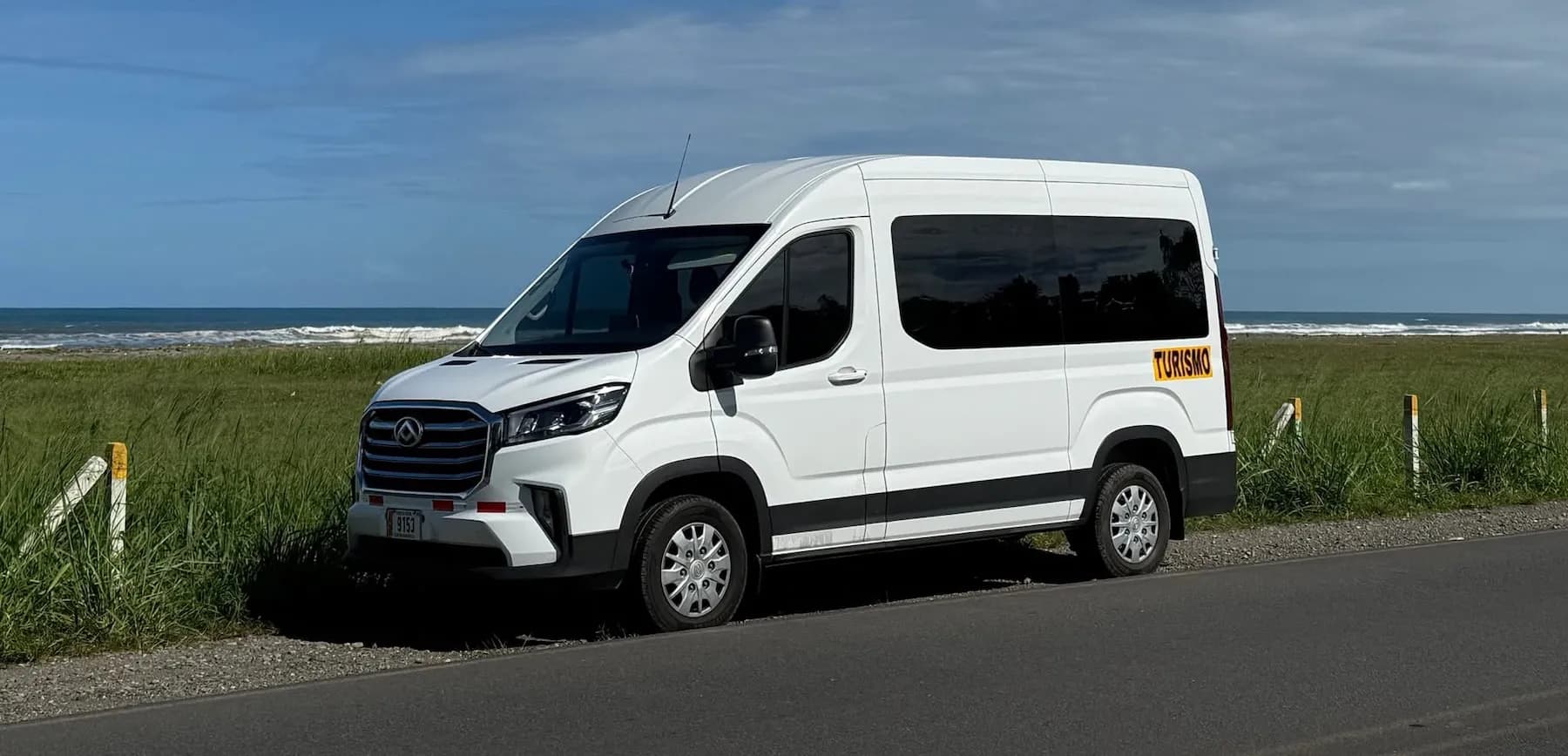 Go Arenal Travel van on a rainforest road in Costa Rica